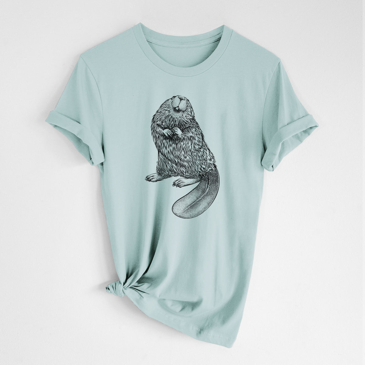 Dusty blue lightweight cotton t-shirt laid flat with the sleeves rolled, printed with a detailed black ink illustration of an American beaver sitting upright with its flat tail.