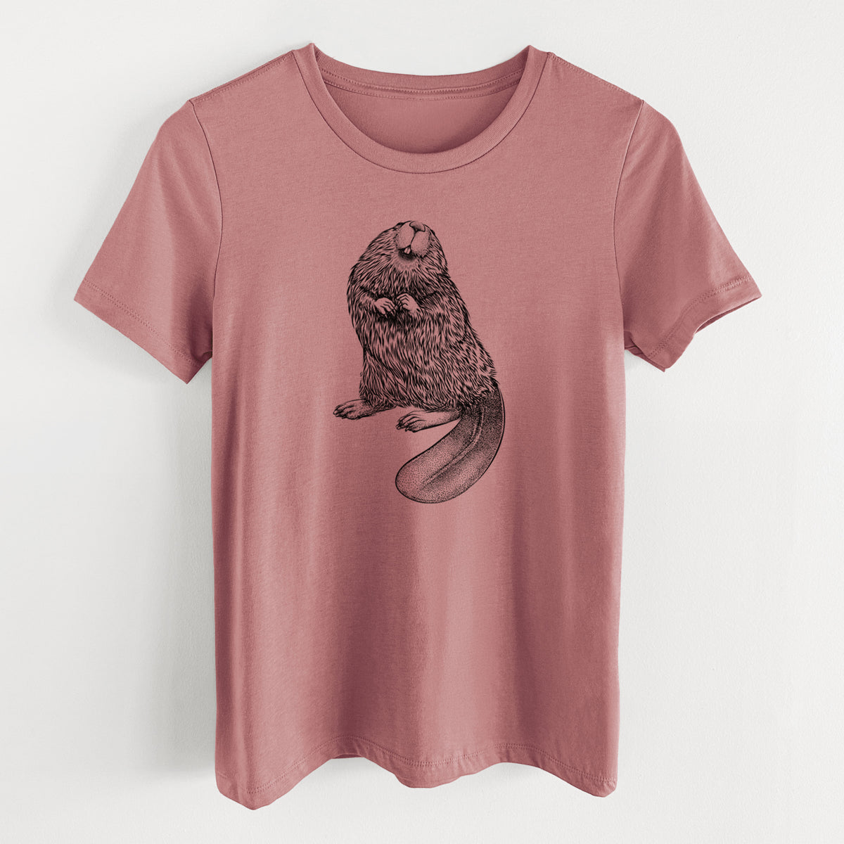 Mauve pink women's relaxed fit cotton t-shirt laid flat, printed with a detailed black ink illustration of an American beaver sitting upright with its flat tail.