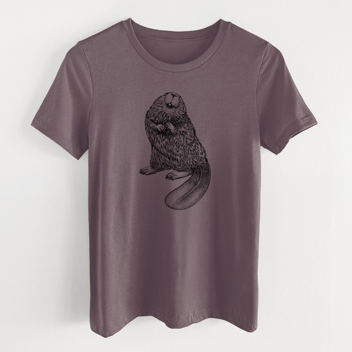 Purple storm women's relaxed fit cotton t-shirt laid flat, printed with a detailed black ink illustration of an American beaver sitting upright with its flat tail.