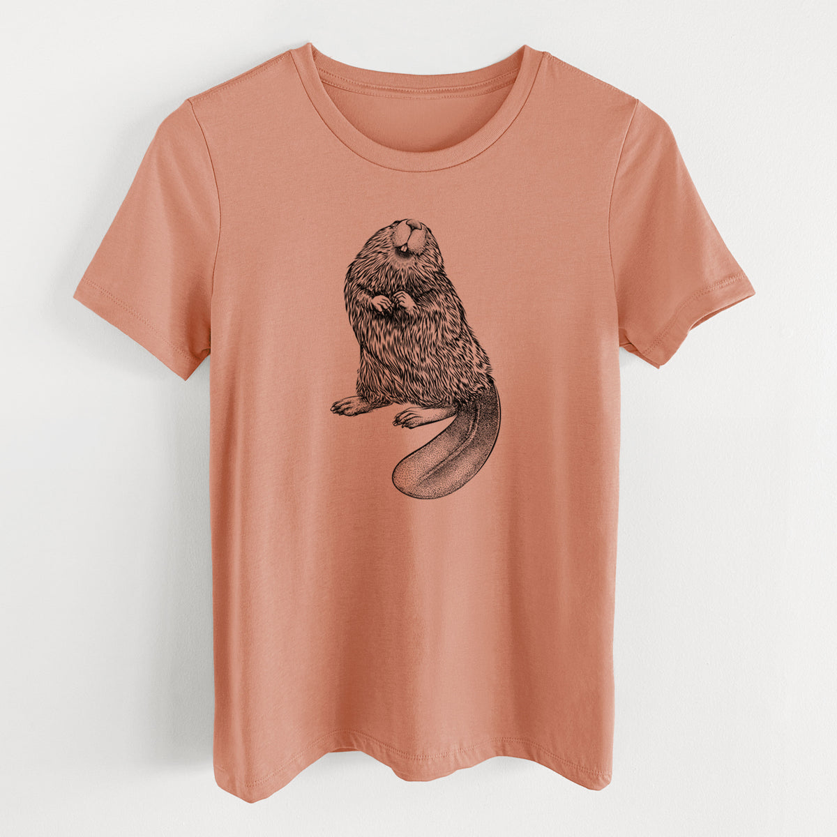 Terracotta orange women's relaxed fit cotton t-shirt laid flat, printed with a detailed black ink illustration of an American beaver sitting upright with its flat tail.