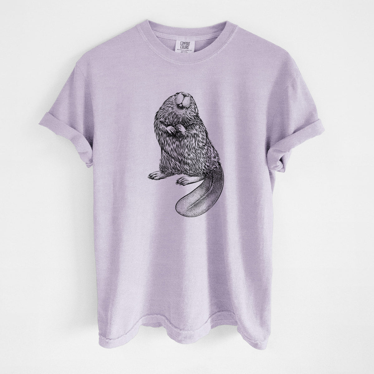 Orchid purple Comfort Colors t-shirt laid flat, printed with a detailed black ink illustration of an American beaver sitting upright with its flat tail.