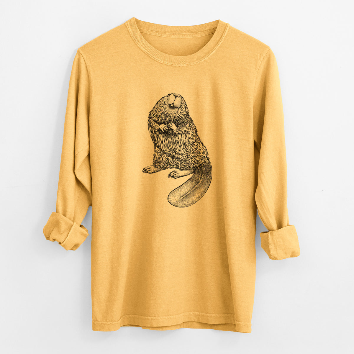 Golden wheat yellow Comfort Colors long sleeve shirt laid flat with the cuffs rolled, printed with a detailed black ink illustration of an American beaver sitting upright with its flat tail.