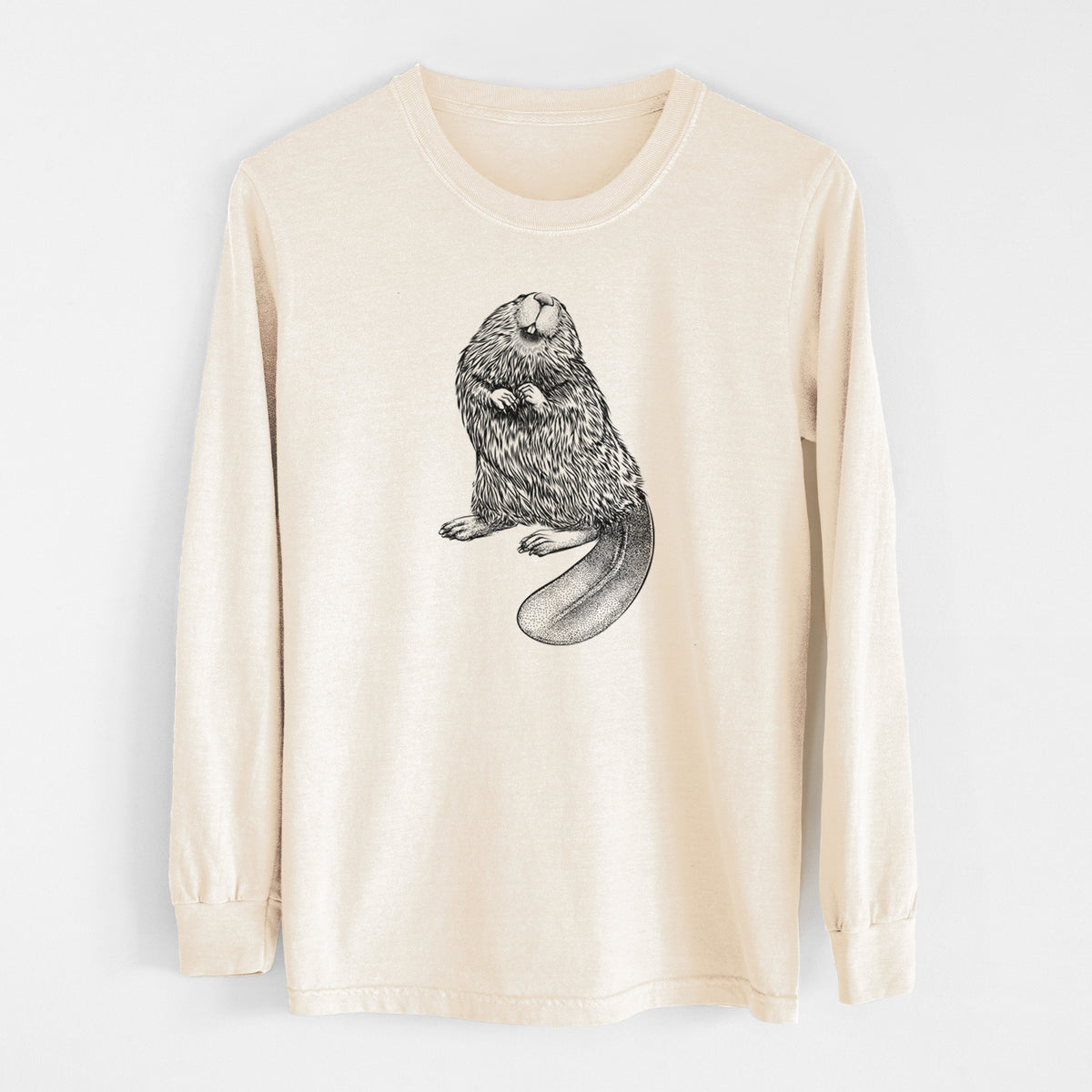 Ivory Comfort Colors long sleeve shirt laid flat, printed with a detailed black ink illustration of an American beaver sitting upright with its flat tail.