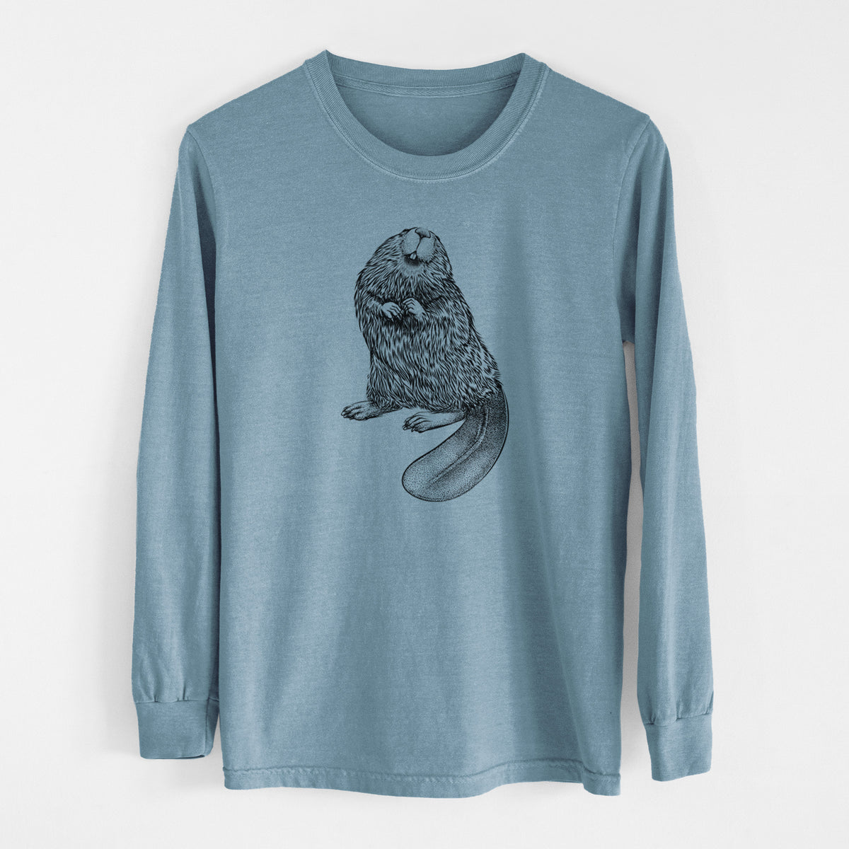Steel blue Comfort Colors long sleeve shirt laid flat, printed with a detailed black ink illustration of an American beaver sitting upright with its flat tail.