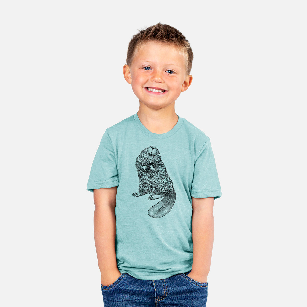 Smiling boy wearing a youth t-shirt printed with a detailed black ink illustration of an American beaver sitting upright with its flat tail.