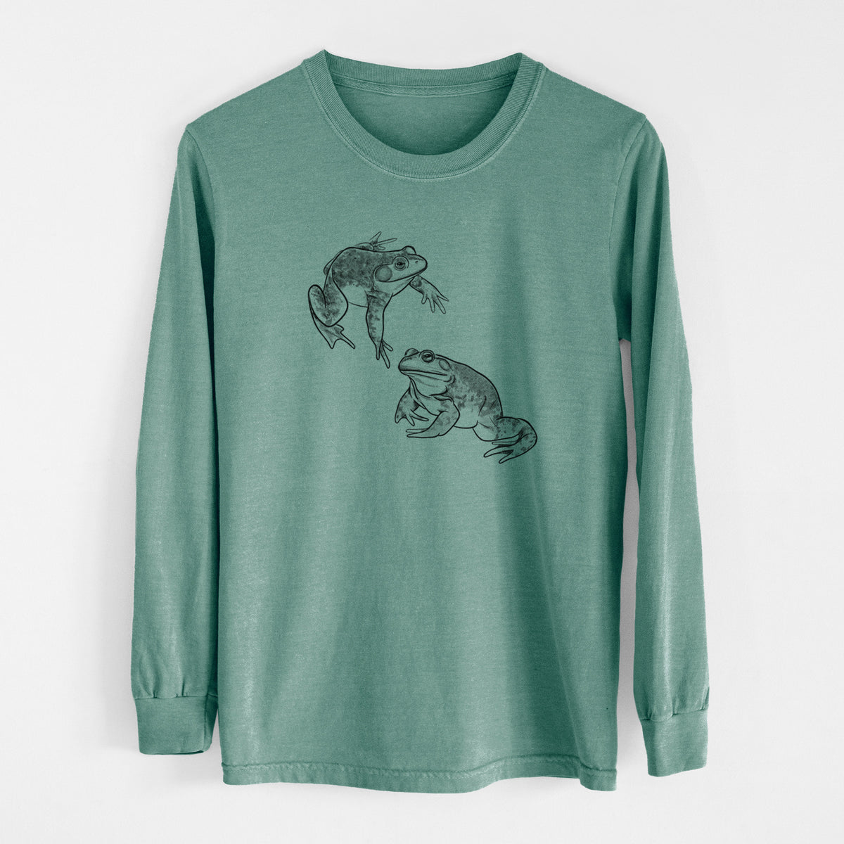 Pine green Comfort Colors long sleeve shirt laid flat, printed with a detailed black ink illustration of two American bullfrogs.