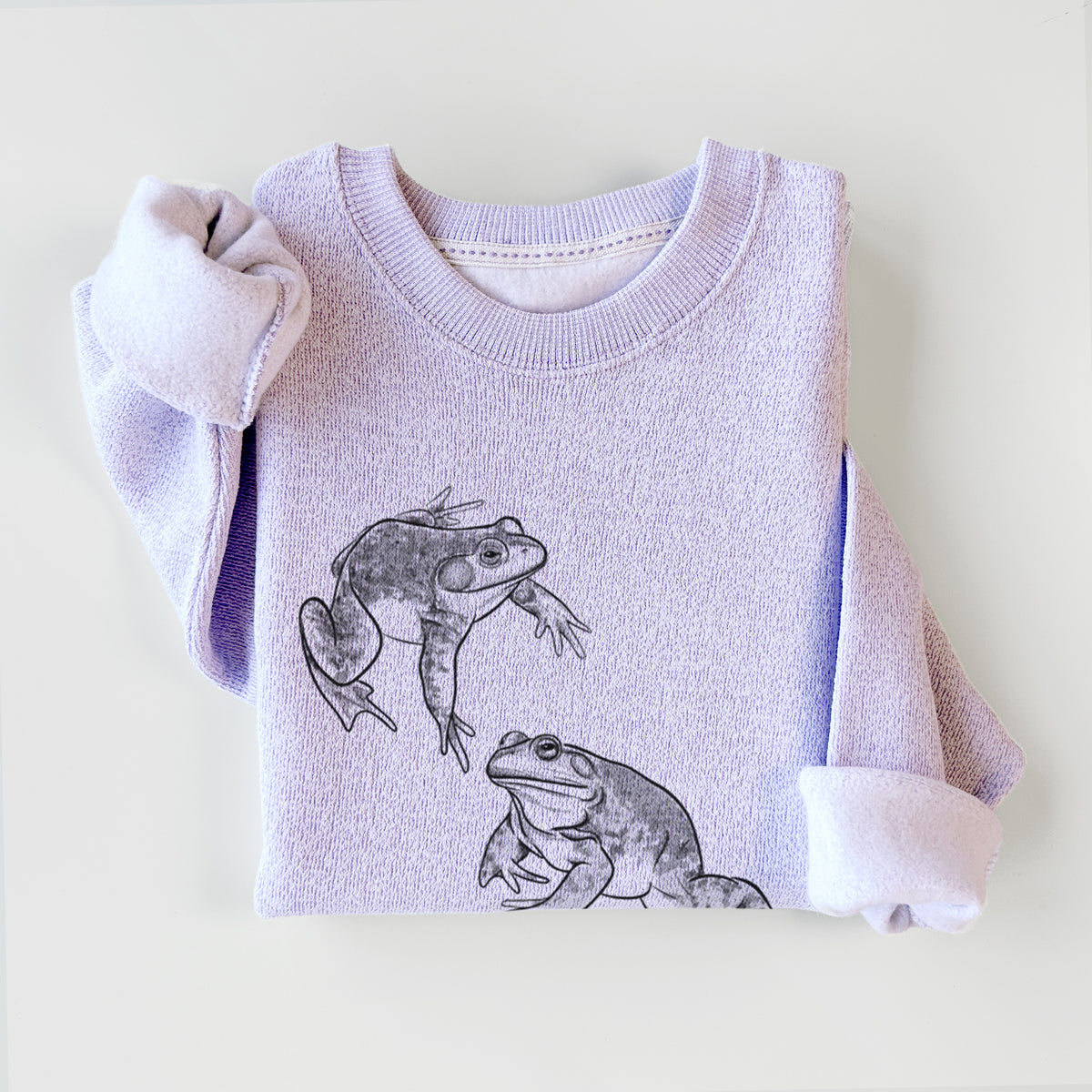 Ice purple knit sweatshirt printed with a detailed black ink illustration of two American bullfrogs, styled flat.