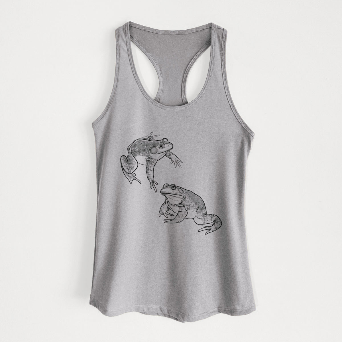 Heather grey women's racerback tank top laid flat, printed with a detailed black ink illustration of two American bullfrogs.