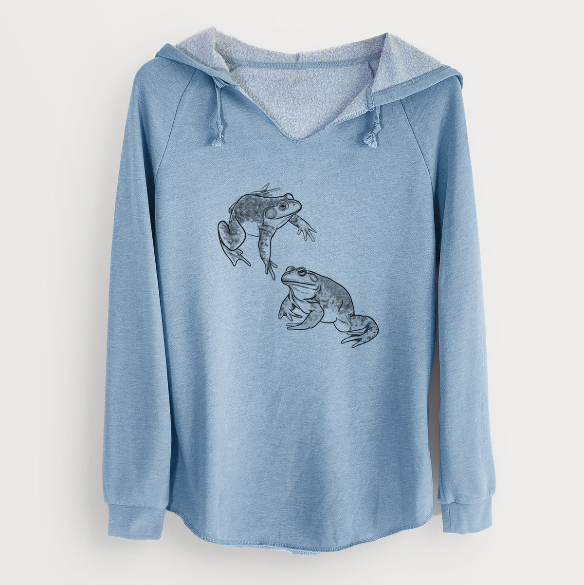 Misty blue women's Cali Wave hooded sweatshirt laid flat, printed with a detailed black ink illustration of two American bullfrogs.