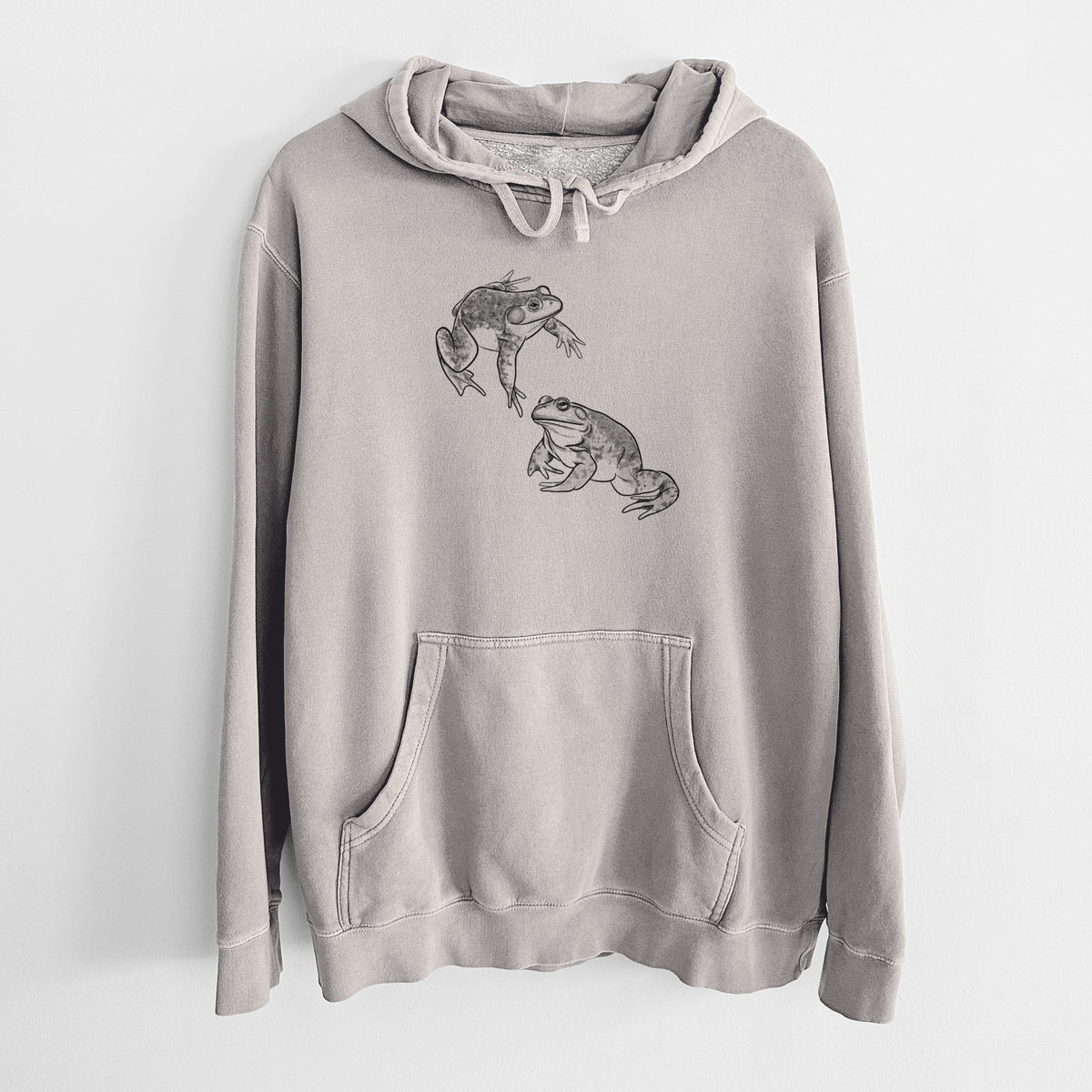 Cement grey pigment dyed hoodie laid flat, printed with a detailed black ink illustration of two American bullfrogs.