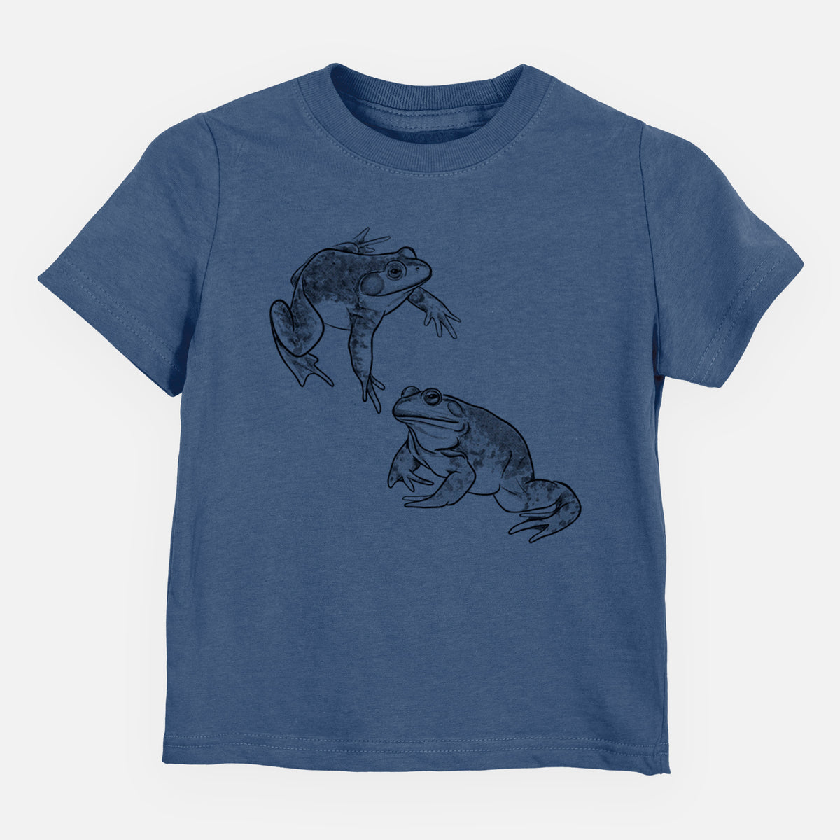 Indigo blue toddler t-shirt laid flat, printed with a detailed black ink illustration of two American bullfrogs.