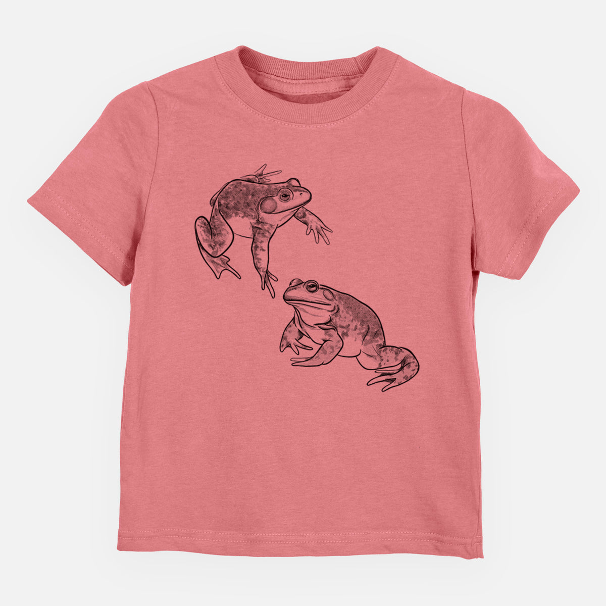 Mauve pink toddler t-shirt laid flat, printed with a detailed black ink illustration of two American bullfrogs.