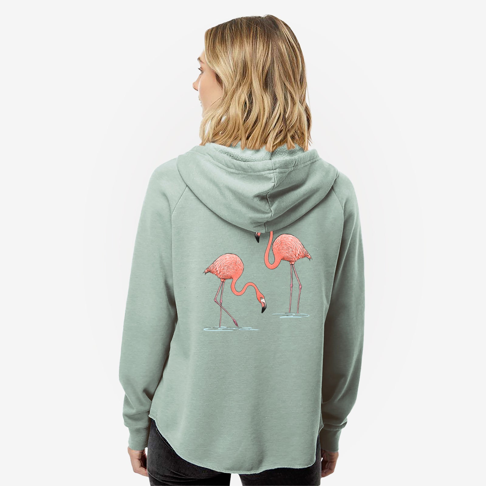 Women's Cali Wave zip-up sweatshirt printed with two pink American flamingos wading in water, one feeding with its head down and one standing tall, with a close-up of the zipper.