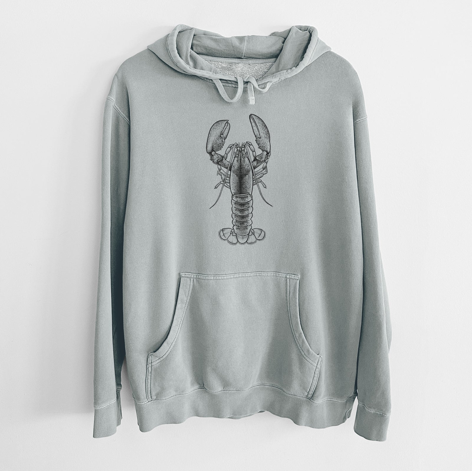 Sage green pigment dyed hoodie laid flat, printed with a detailed black ink illustration of an American lobster with its claws raised, seen from above.