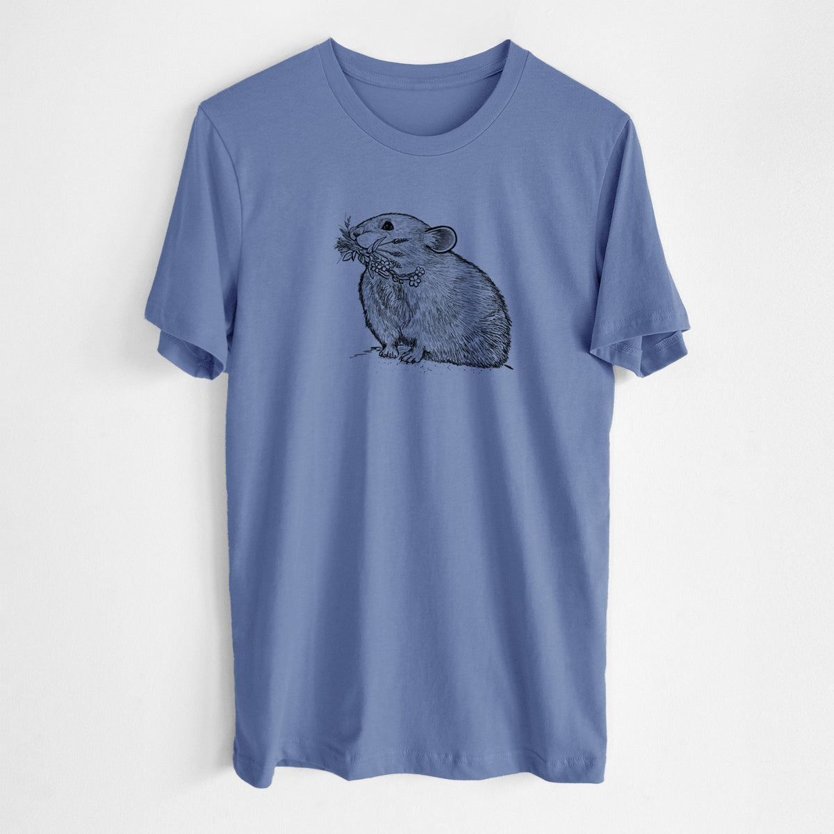 Blue bell lightweight cotton t-shirt laid flat, printed with a detailed black ink illustration of an American pika holding flowers and grass in its mouth.