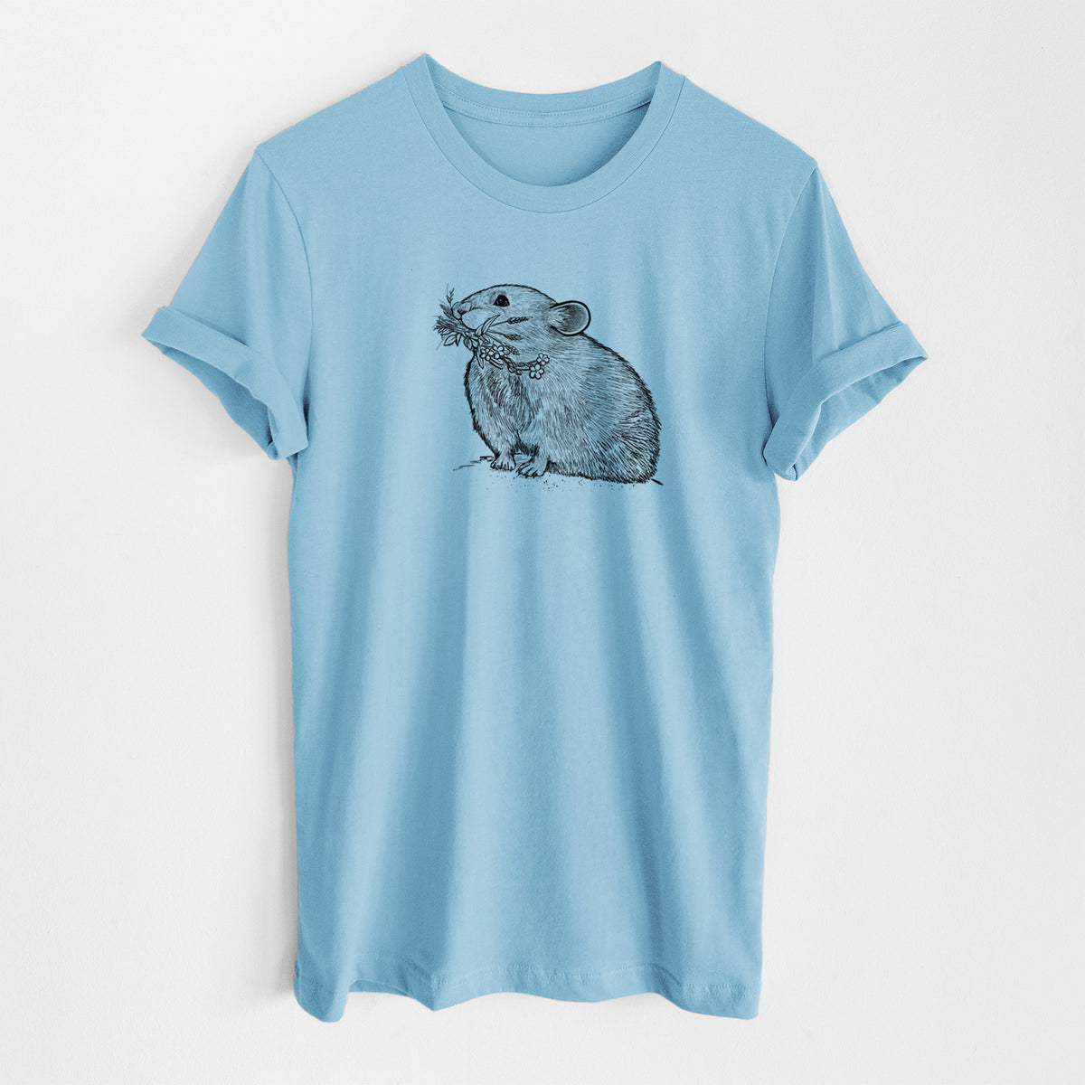 Ocean blue lightweight cotton t-shirt laid flat, printed with a detailed black ink illustration of an American pika holding flowers and grass in its mouth.