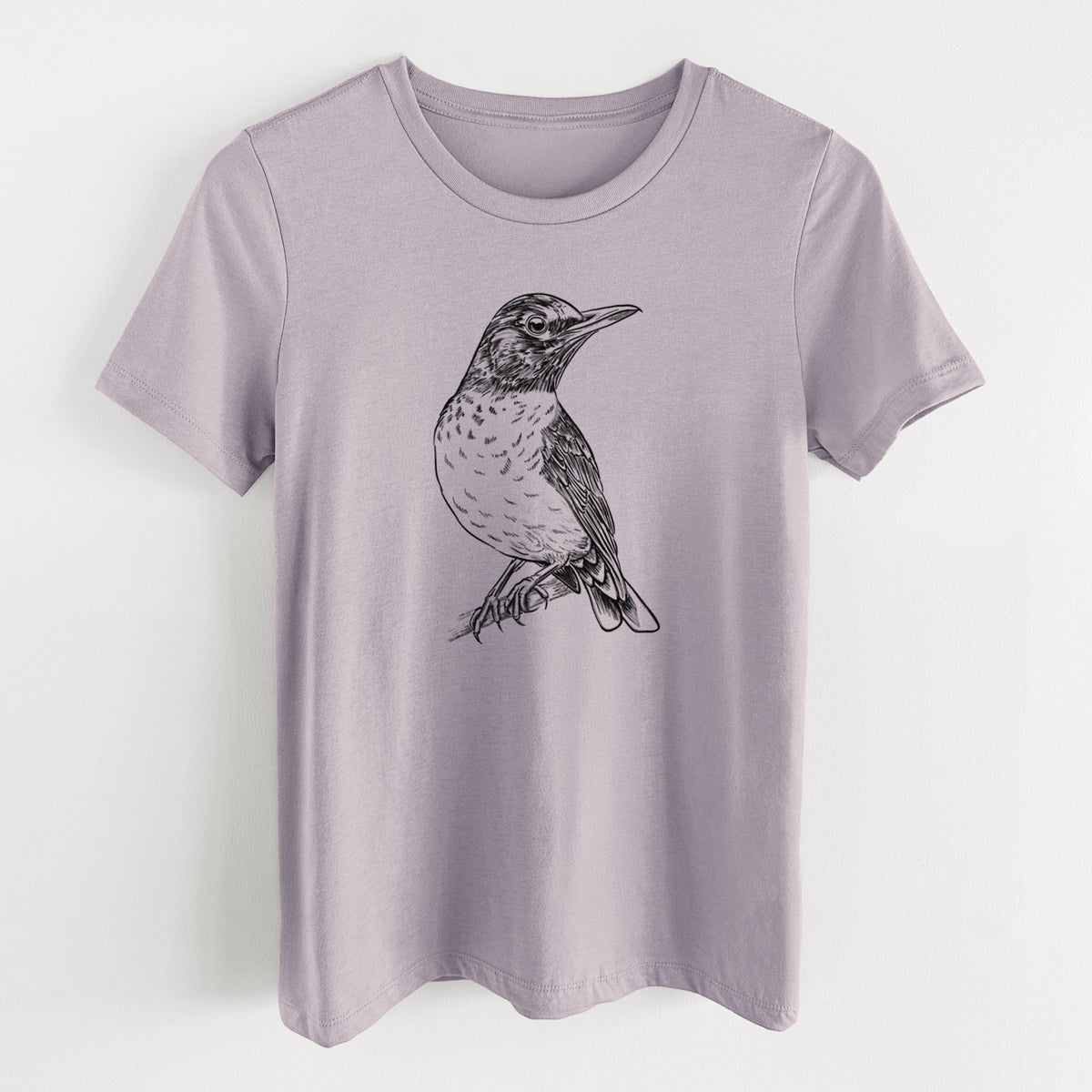 Light violet women's relaxed fit cotton t-shirt laid flat, printed with a detailed black ink sketch of an American robin perched on a branch.