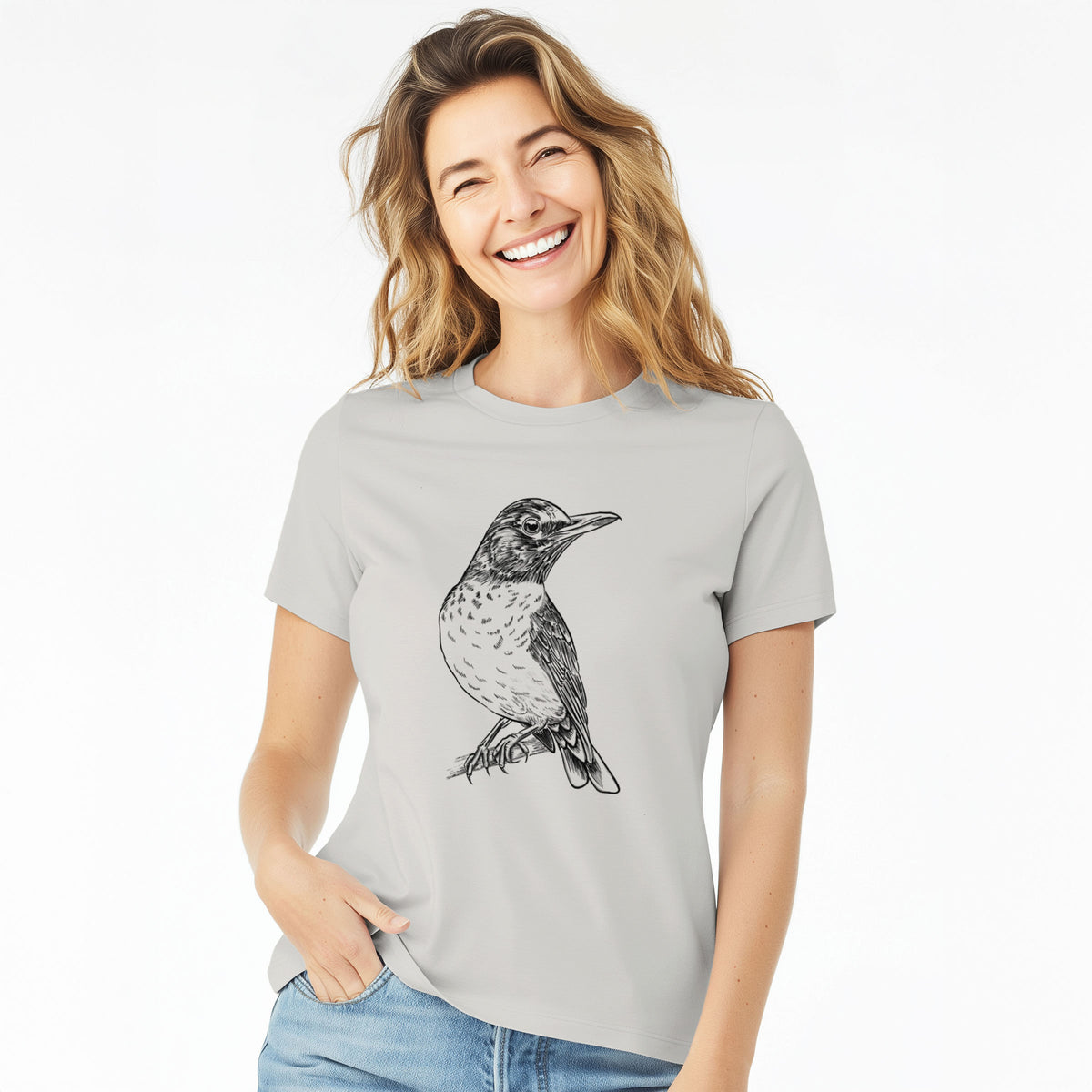 Woman wearing a lunar grey women's relaxed fit cotton t-shirt printed with a detailed black ink sketch of an American robin perched on a branch.