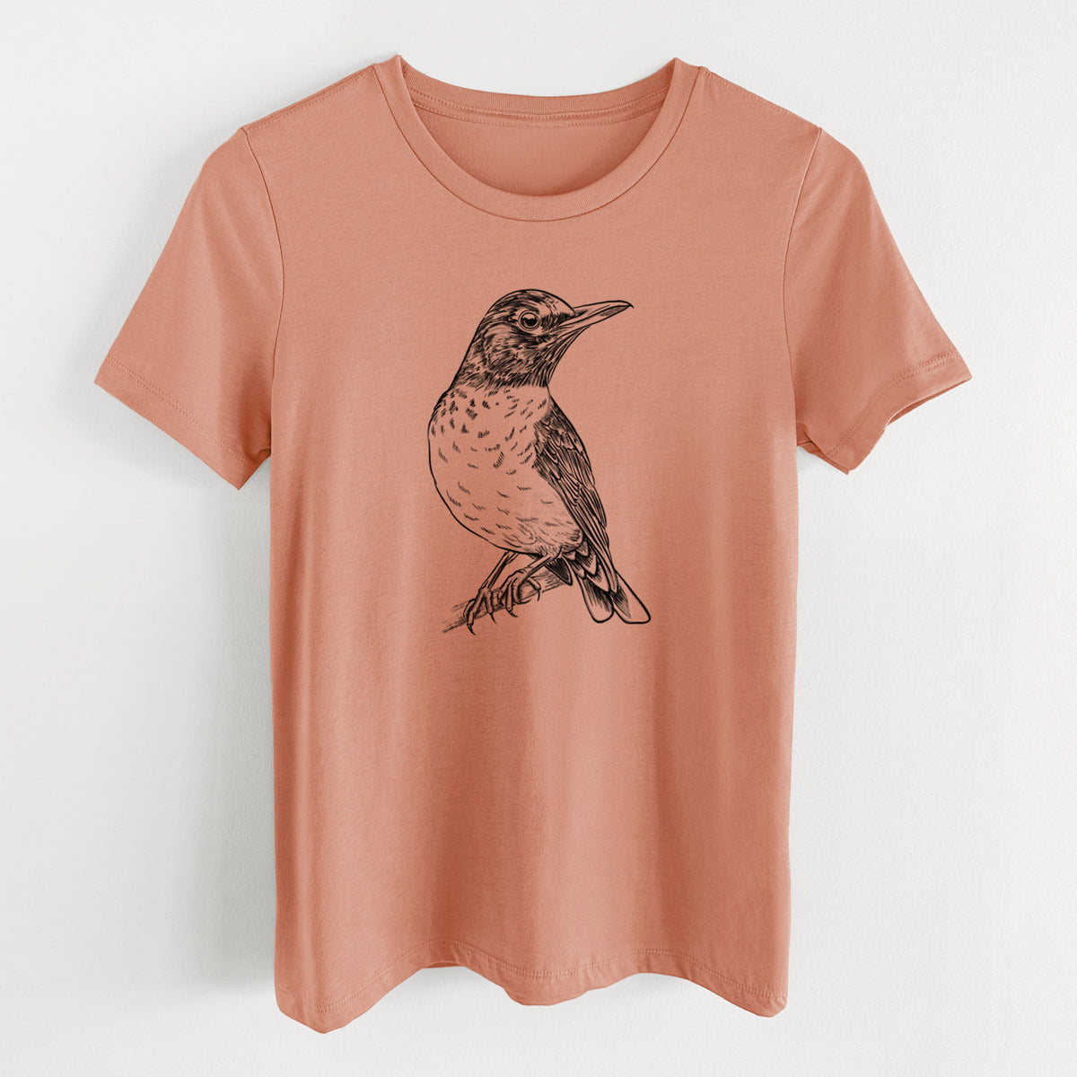 Terracotta orange women's relaxed fit cotton t-shirt laid flat, printed with a detailed black ink sketch of an American robin perched on a branch.