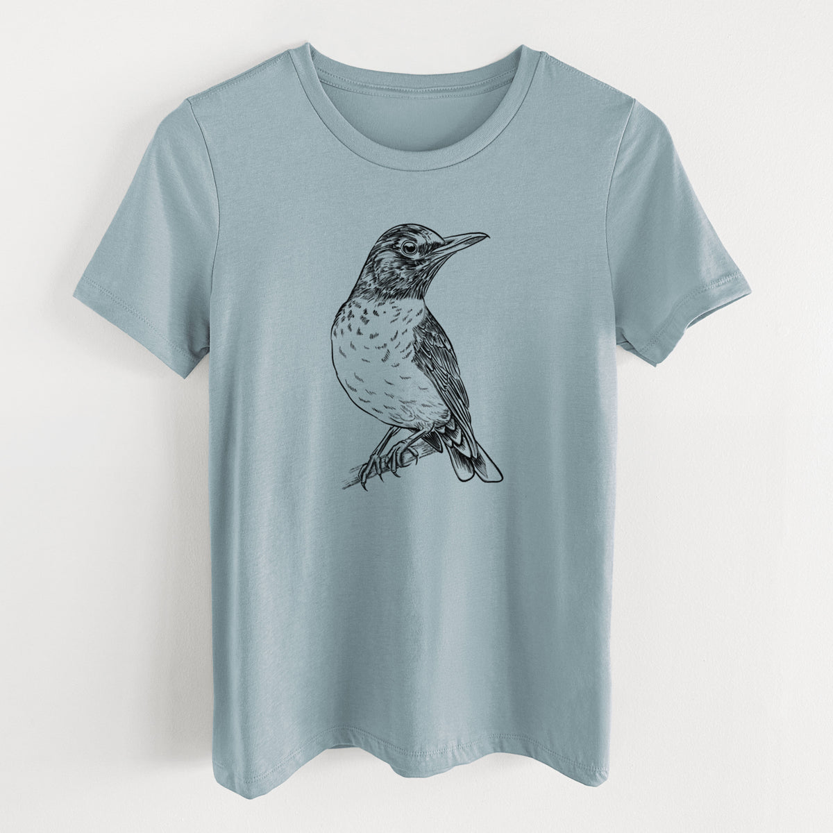 Vintage denim women's relaxed fit cotton t-shirt laid flat, printed with a detailed black ink sketch of an American robin perched on a branch.