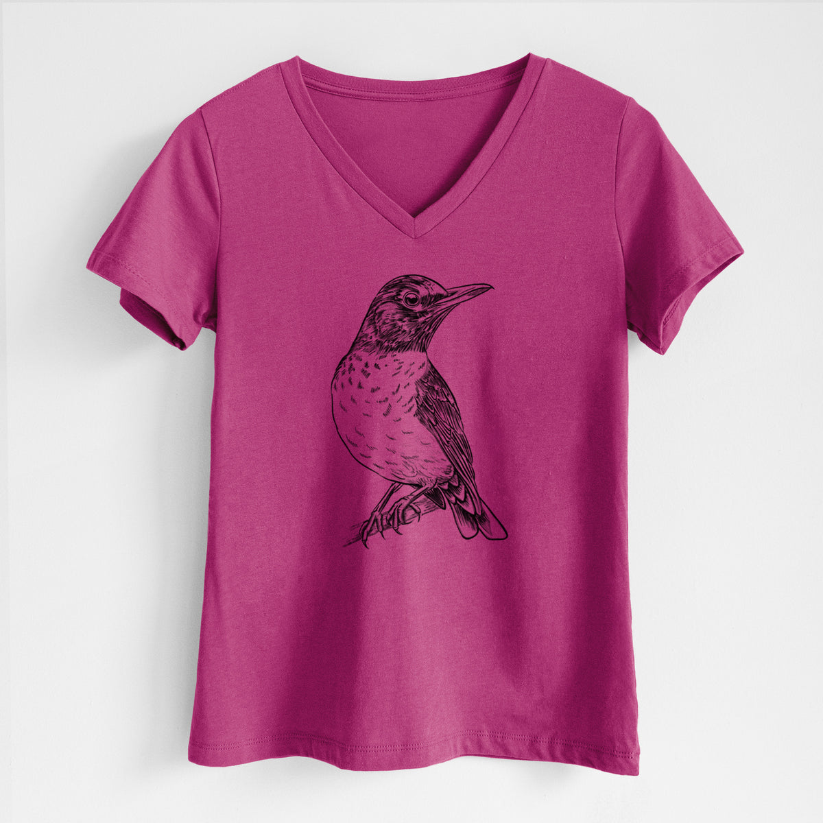 Berry pink women's relaxed fit cotton V-neck t-shirt laid flat, printed with a detailed black ink sketch of an American robin perched on a branch.