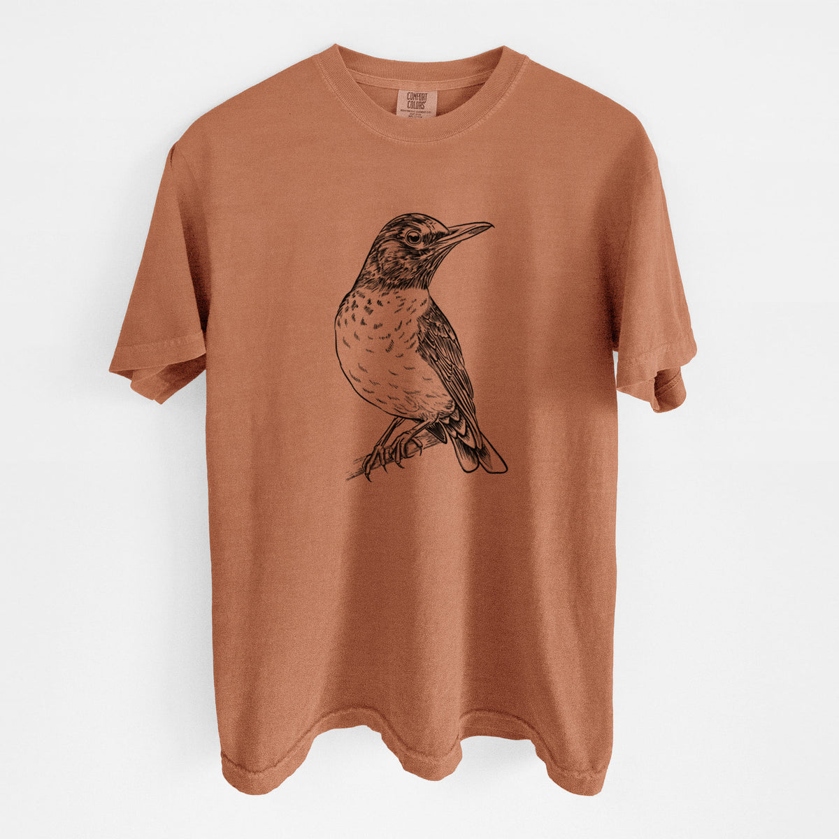 Yam burnt orange Comfort Colors t-shirt laid flat, printed with a detailed black ink sketch of an American robin perched on a branch.