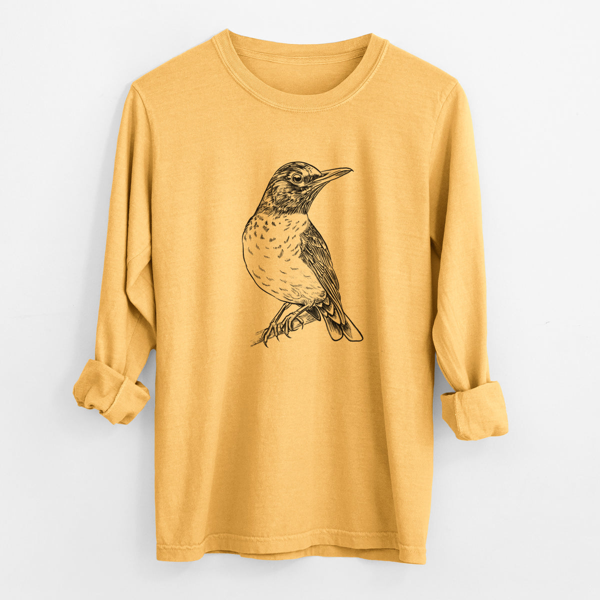 Golden wheat yellow Comfort Colors long sleeve shirt laid flat with the cuffs rolled, printed with a detailed black ink sketch of an American robin perched on a branch.