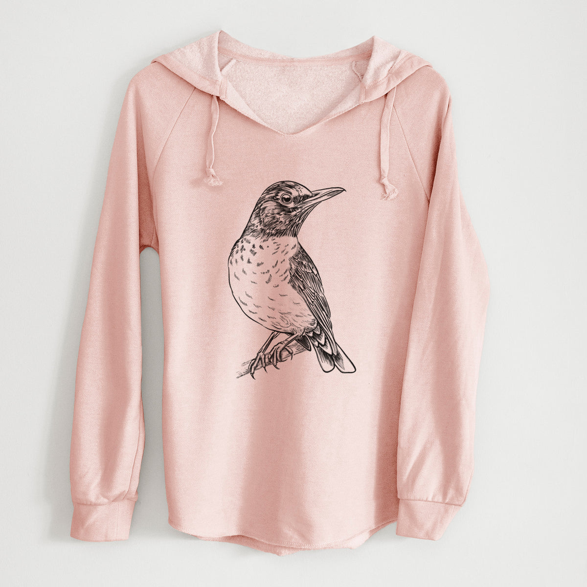 Blush pink women's Cali Wave hooded sweatshirt laid flat, printed with a detailed black ink sketch of an American robin perched on a branch.