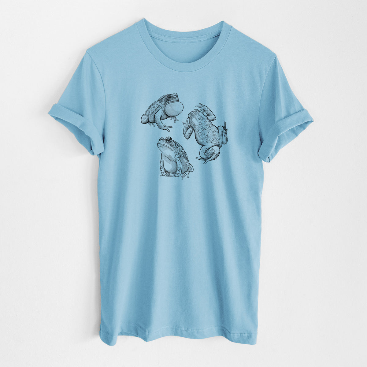 Ocean blue lightweight cotton t-shirt laid flat, printed with a black ink illustration of three American toads.
