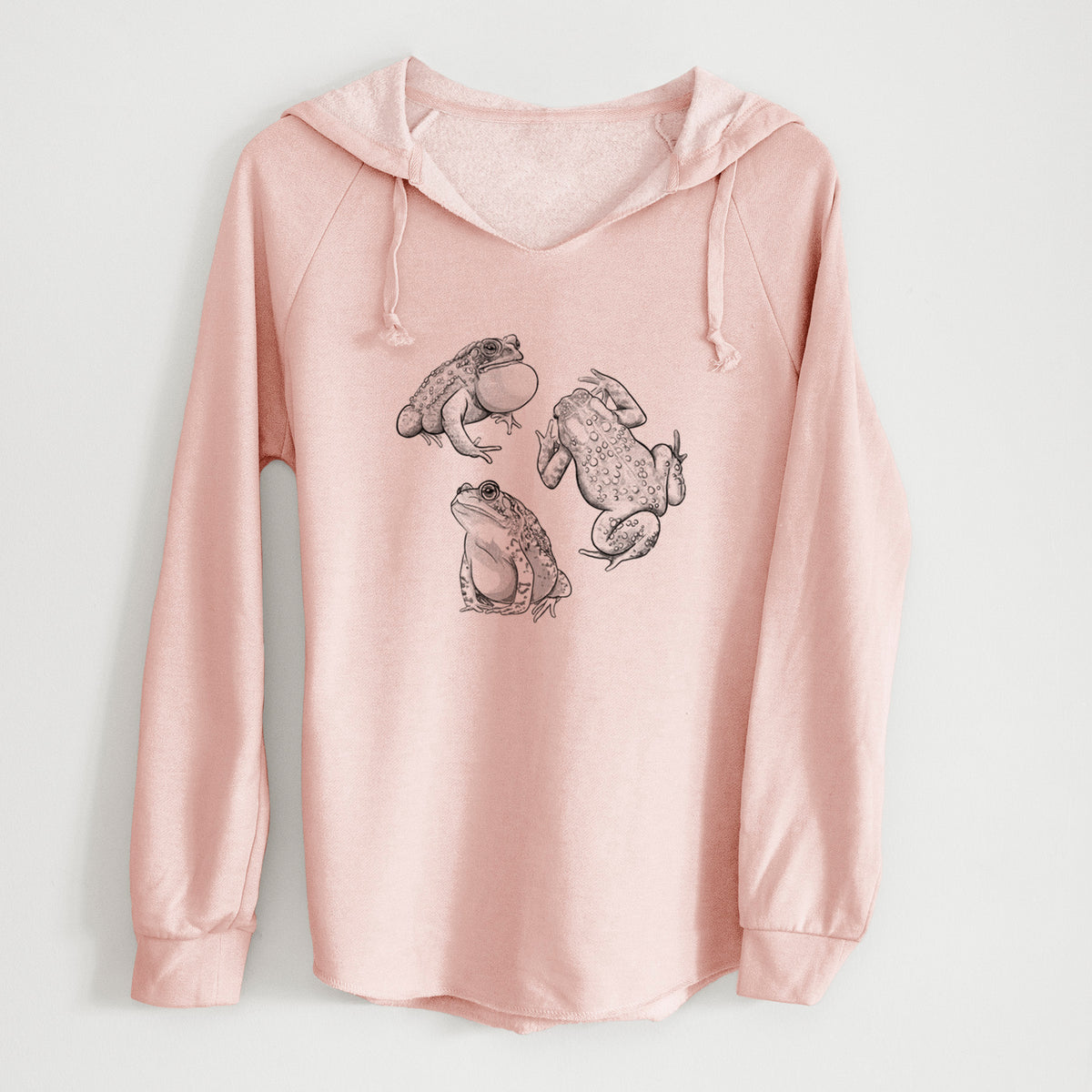 Blush pink women's Cali Wave hooded sweatshirt laid flat, printed with a black ink illustration of three American toads.