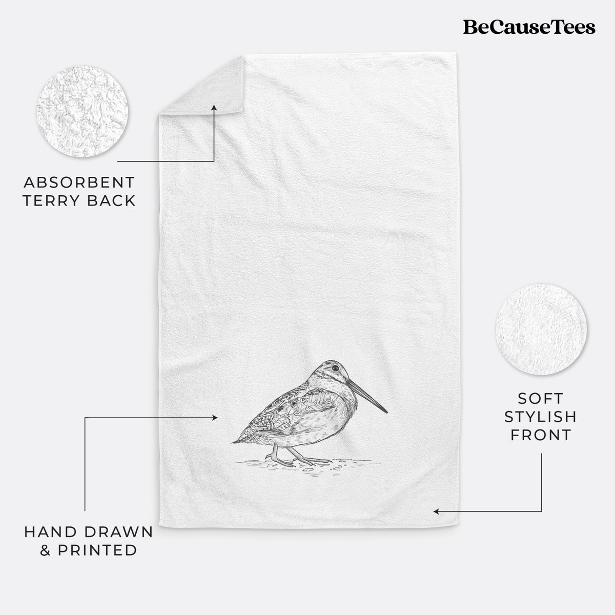 White hand towel printed with a detailed black ink sketch of an American woodcock standing on the ground.