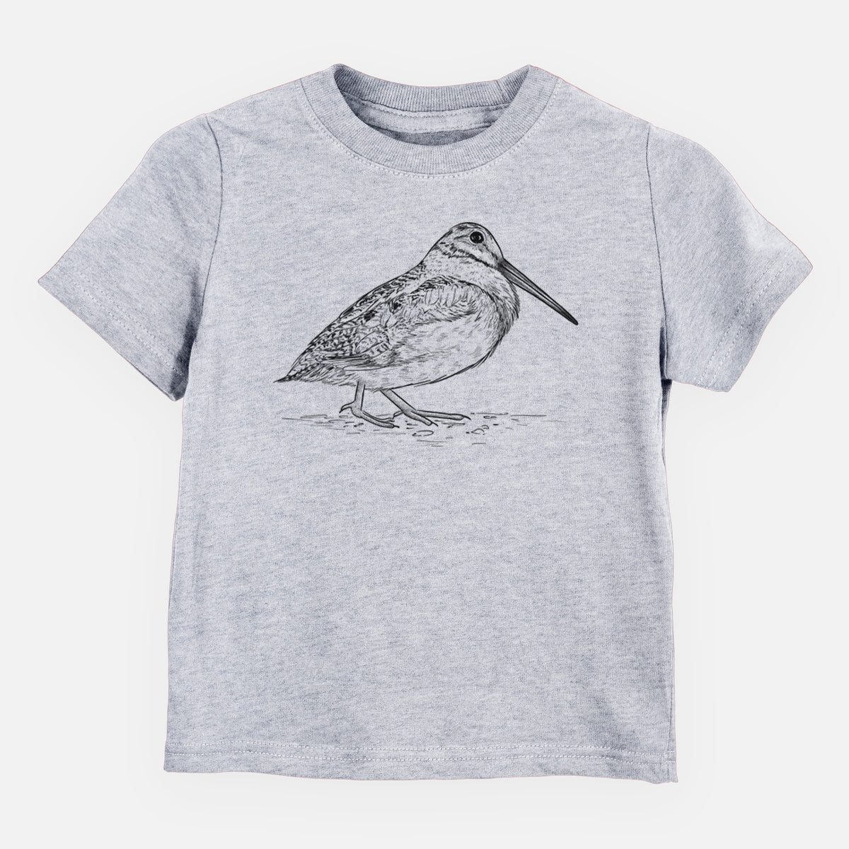 Heather grey toddler t-shirt laid flat, printed with a detailed black ink sketch of an American woodcock standing on the ground.