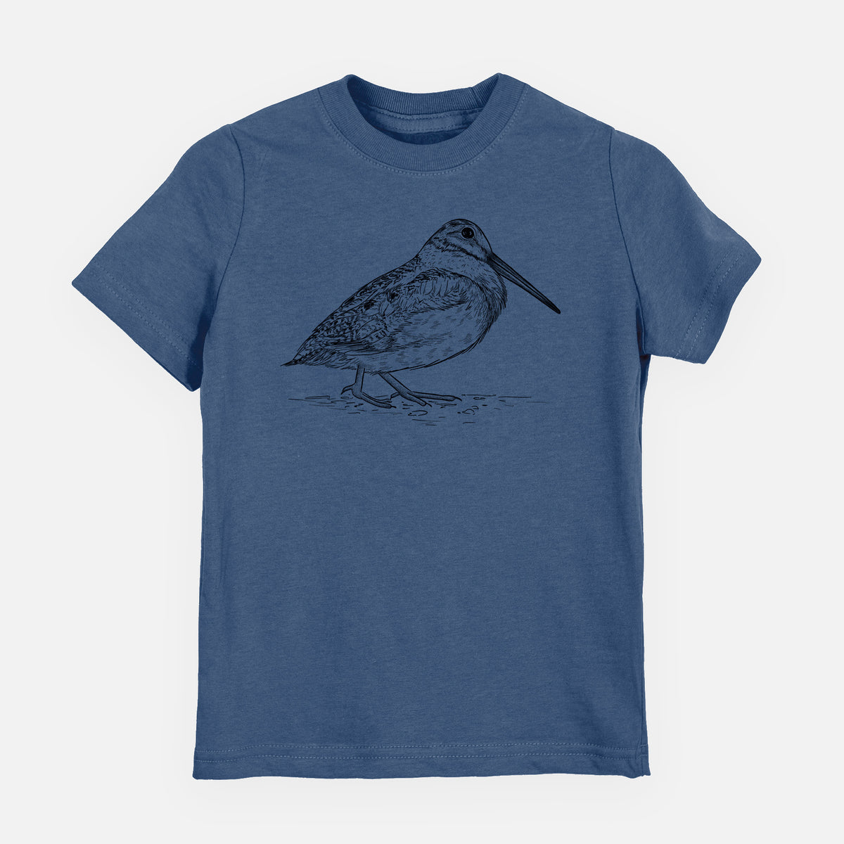 Indigo blue youth t-shirt laid flat, printed with a detailed black ink sketch of an American woodcock standing on the ground.