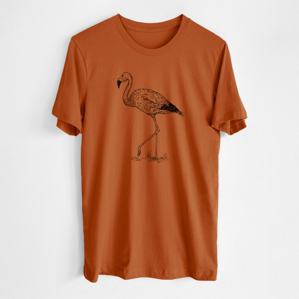 Autumn lightweight cotton t-shirt laid flat, printed with a black ink illustration of an Andean flamingo standing on one leg.