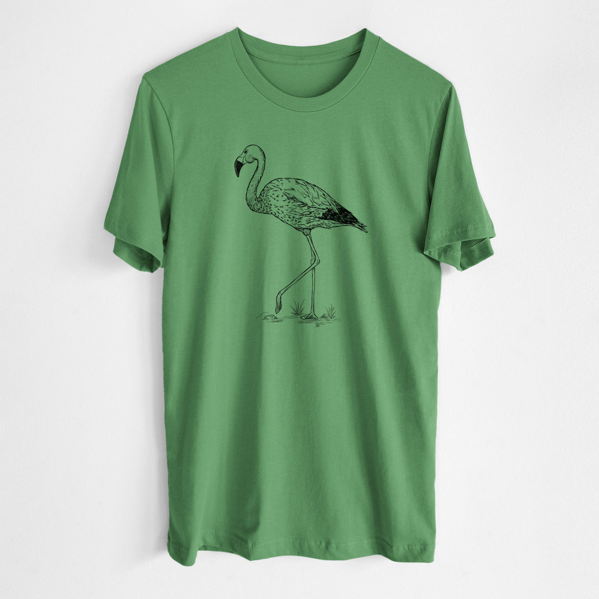 Leaf green lightweight cotton t-shirt laid flat, printed with a black ink illustration of an Andean flamingo standing on one leg.