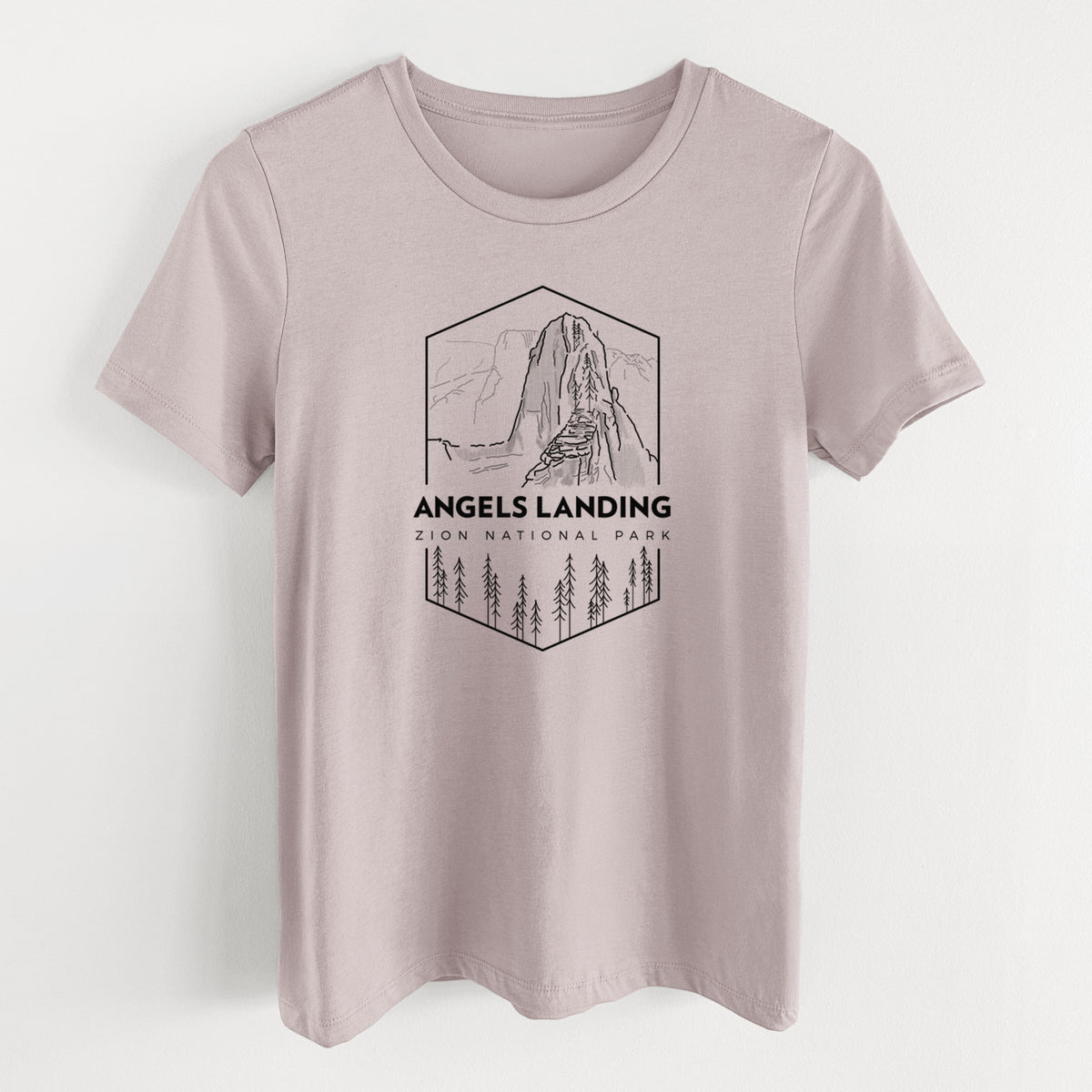 Pink gravel women's relaxed fit cotton t-shirt laid flat, printed with a black line art badge of Angels Landing above pine trees, with the words Angels Landing, Zion National Park.