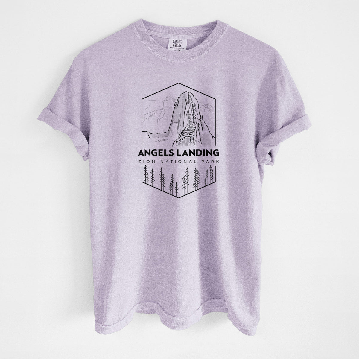 Orchid purple Comfort Colors t-shirt laid flat, printed with a black line art badge of Angels Landing above pine trees, with the words Angels Landing, Zion National Park.