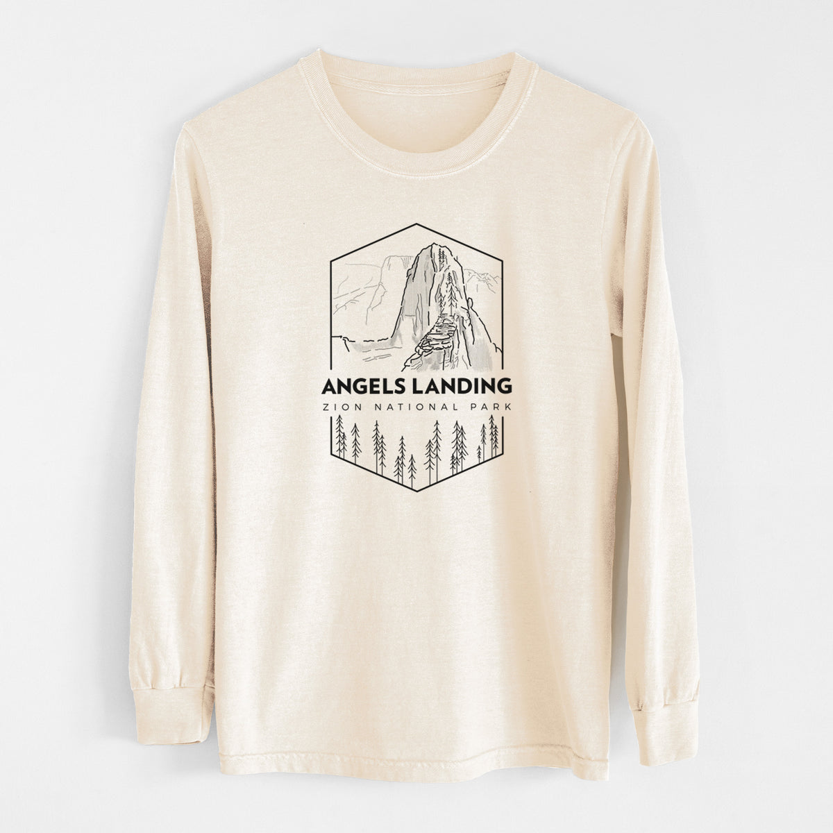Ivory Comfort Colors long sleeve shirt laid flat, printed with a black line art badge of Angels Landing above pine trees, with the words Angels Landing, Zion National Park.