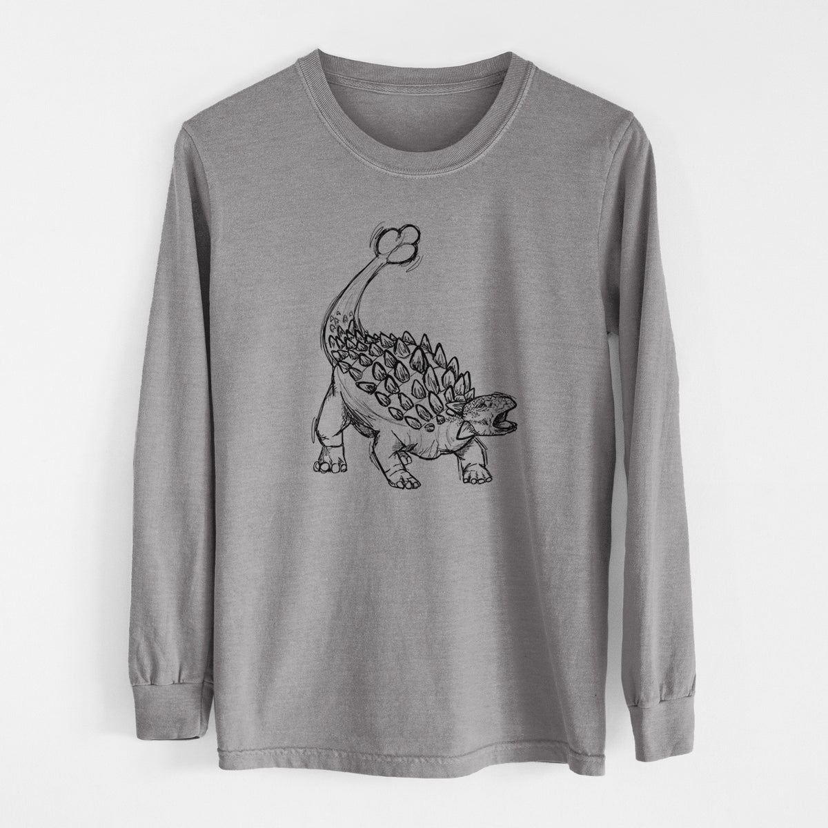 Grey Comfort Colors long sleeve shirt laid flat, printed with a black ink illustration of an Ankylosaurus with its club tail raised.