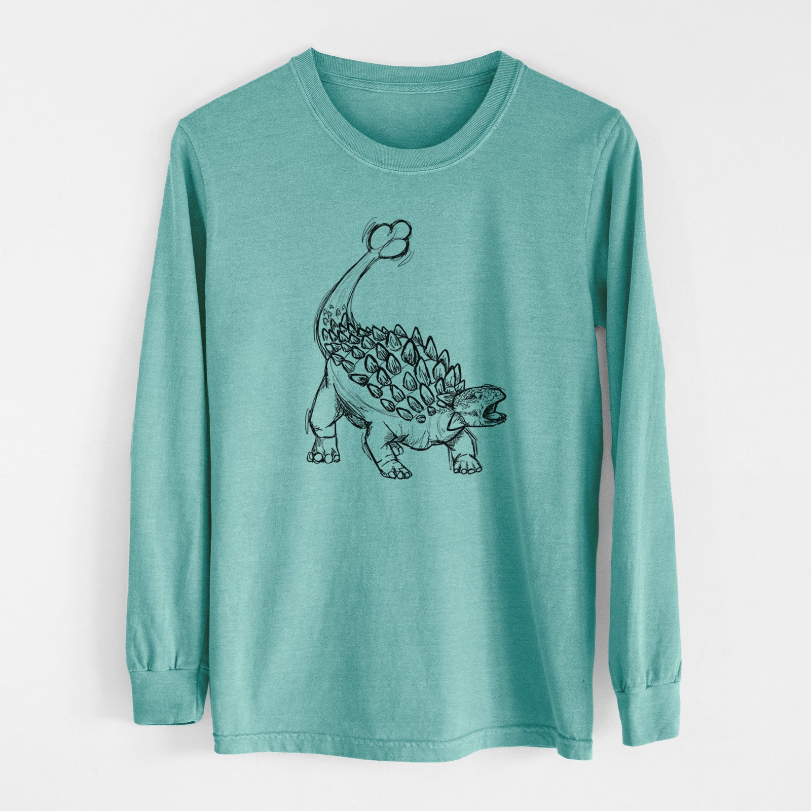 Reef green Comfort Colors long sleeve shirt laid flat, printed with a black ink illustration of an Ankylosaurus with its club tail raised.