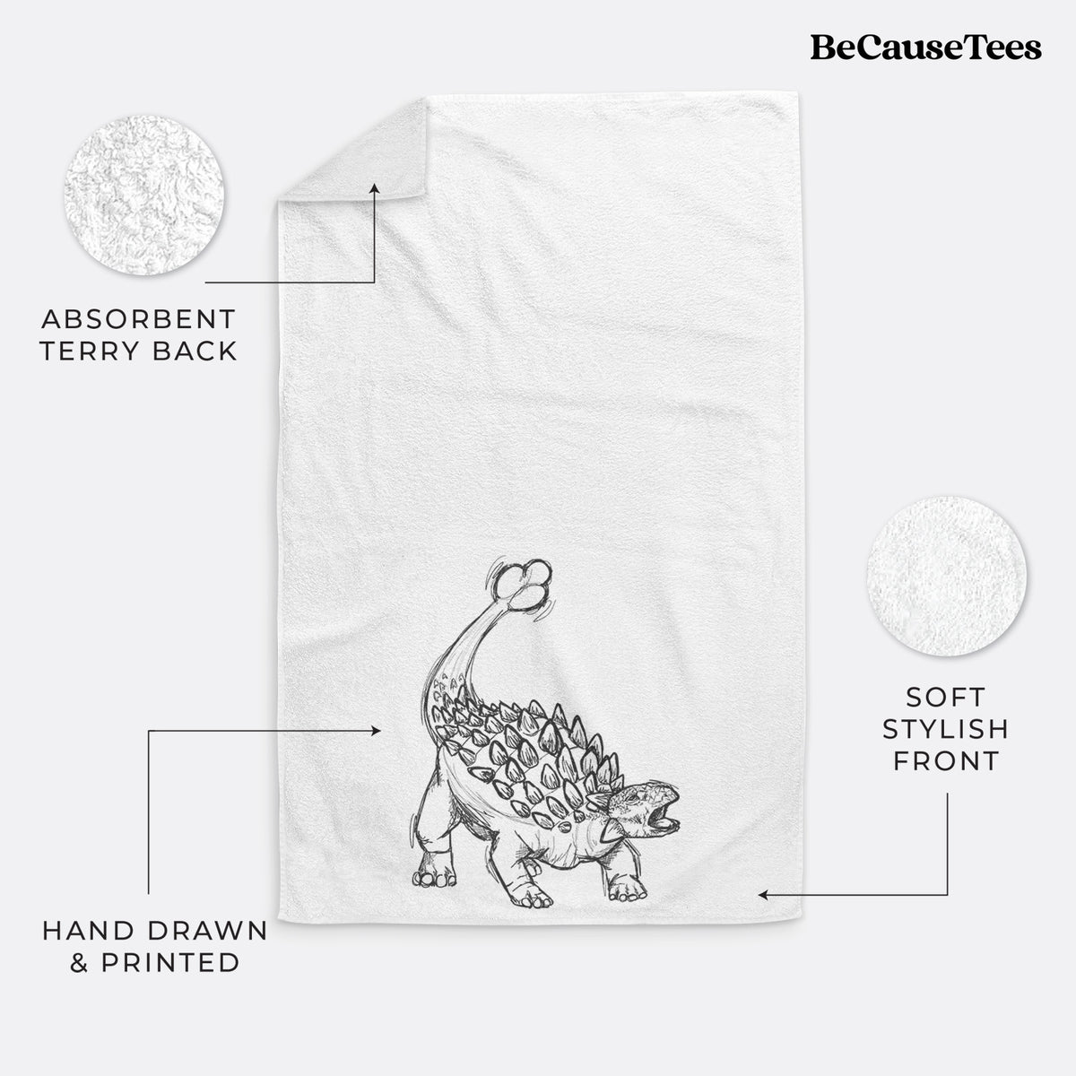 White hand towel printed with a black ink illustration of an Ankylosaurus with its club tail raised.