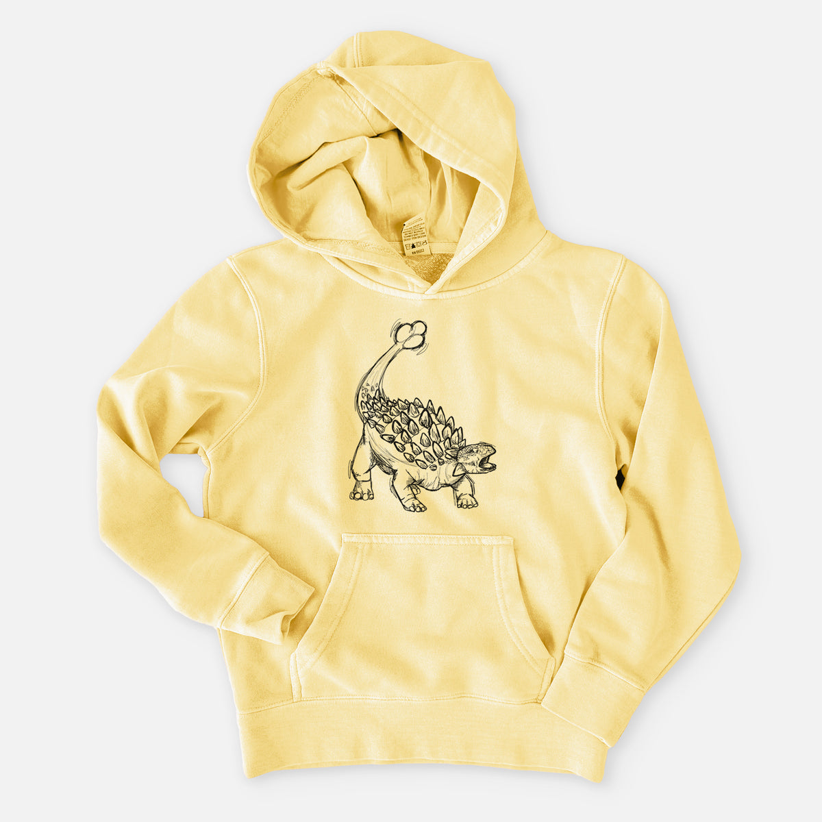 Pigment yellow youth pigment dyed hoodie laid flat, printed with a black ink illustration of an Ankylosaurus with its club tail raised.