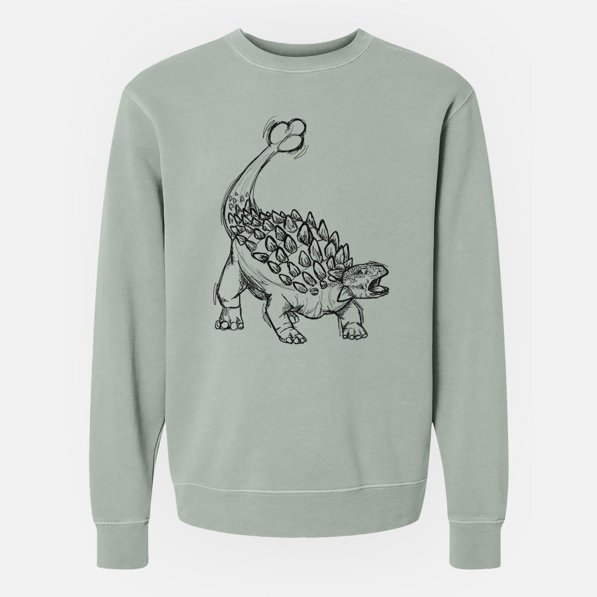 Sage green pigment dyed crewneck sweatshirt laid flat, printed with a black ink illustration of an Ankylosaurus with its club tail raised.