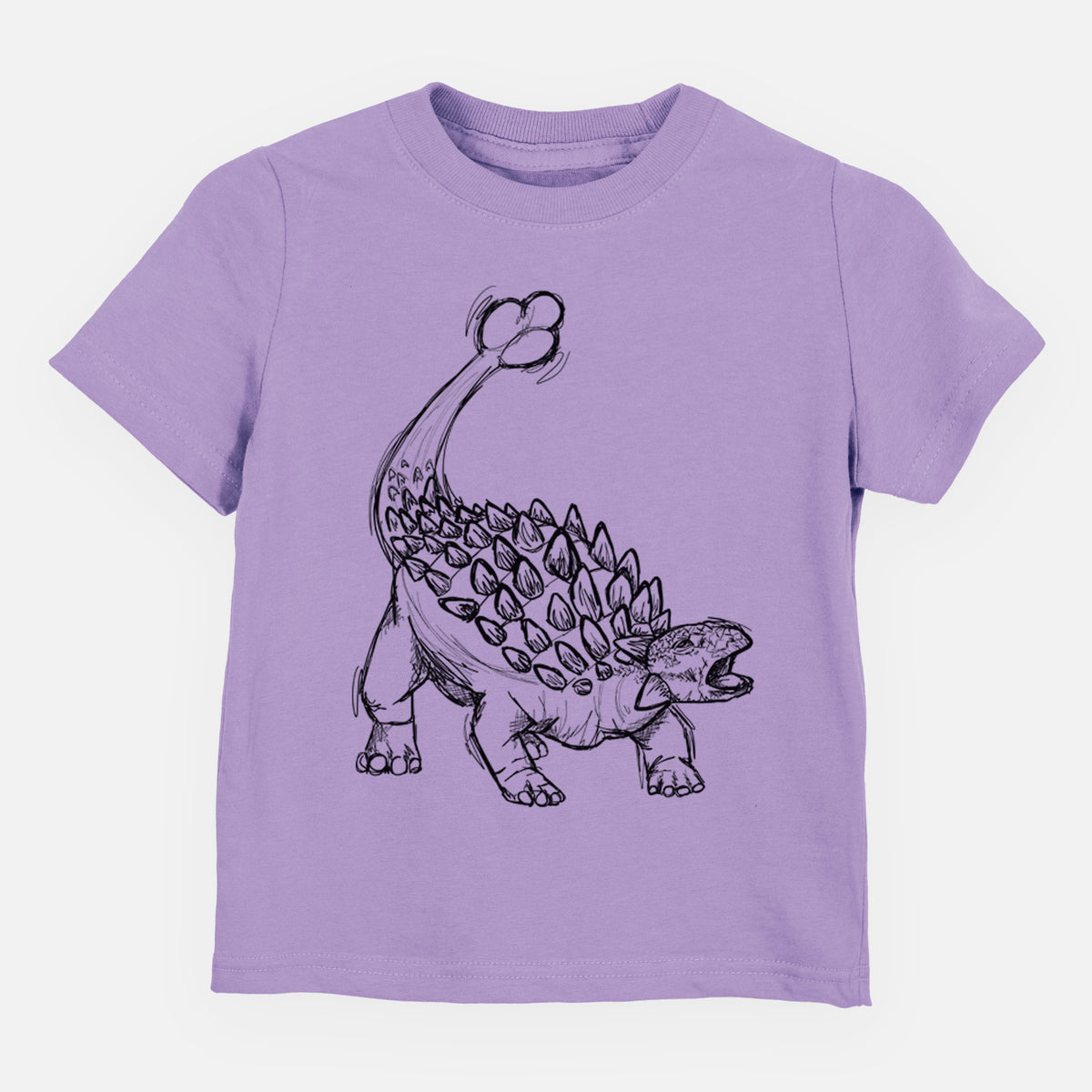 Lavender toddler t-shirt laid flat, printed with a black ink illustration of an Ankylosaurus with its club tail raised.