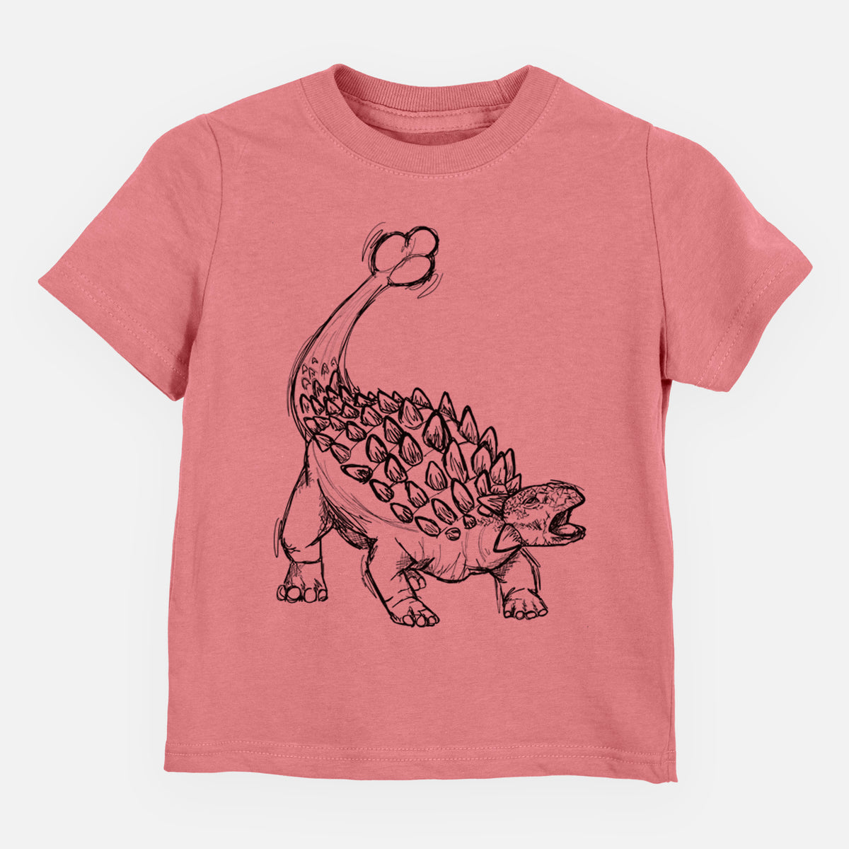 Mauve pink toddler t-shirt laid flat, printed with a black ink illustration of an Ankylosaurus with its club tail raised.