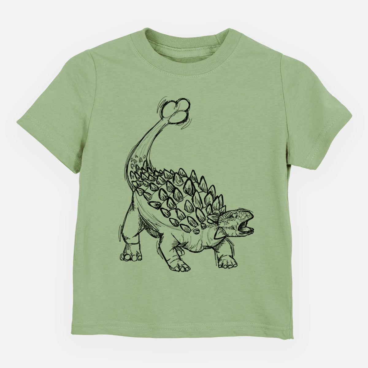 Sage green toddler t-shirt laid flat, printed with a black ink illustration of an Ankylosaurus with its club tail raised.