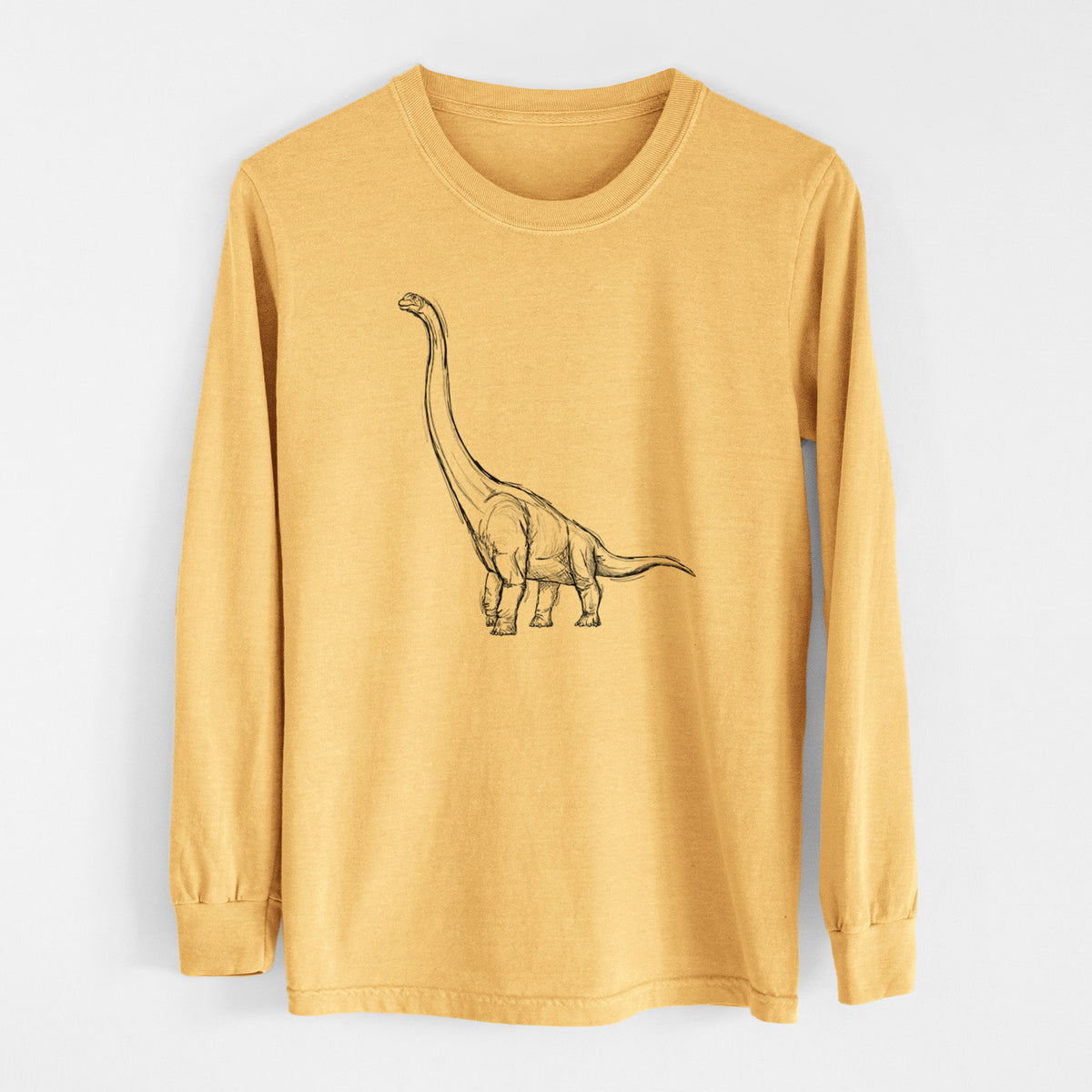 Golden wheat yellow Comfort Colors long sleeve shirt laid flat, printed with a black ink illustration of a long-necked Apatosaurus walking.
