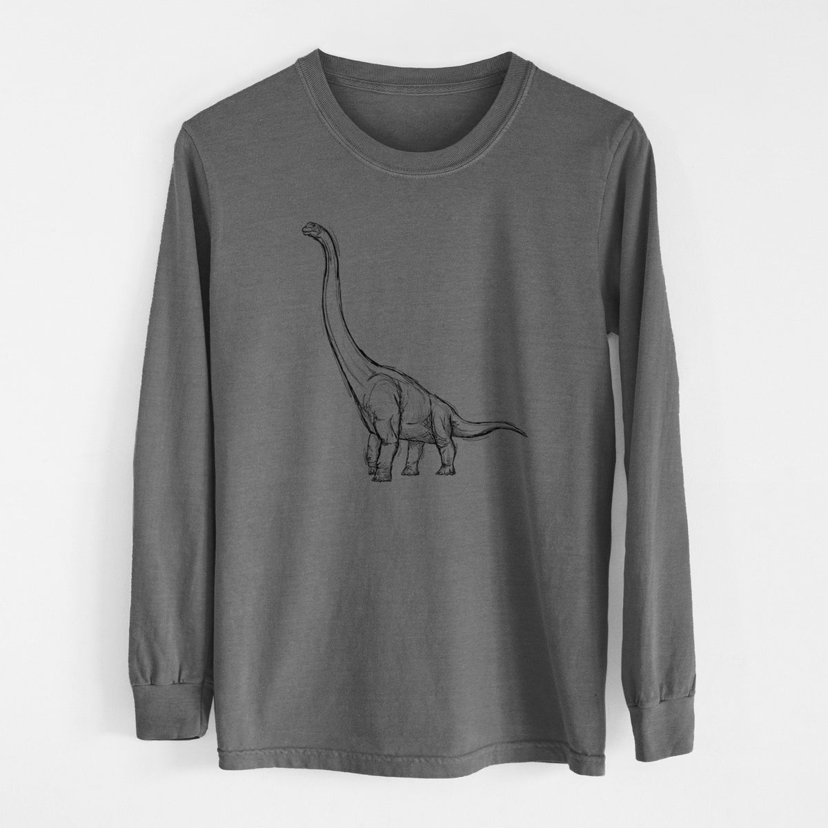 Pepper Comfort Colors long sleeve shirt laid flat, printed with a black ink illustration of a long-necked Apatosaurus walking.