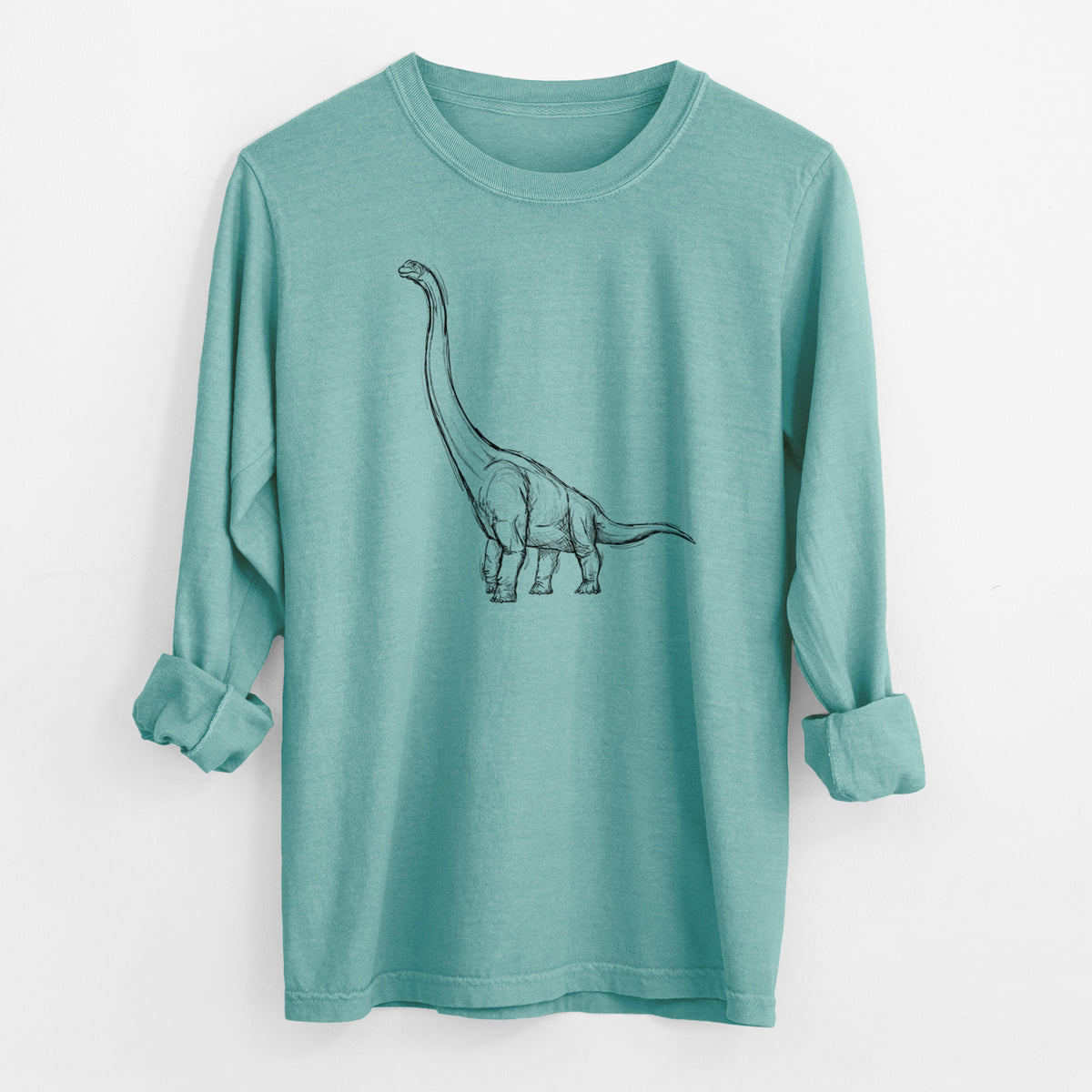 Reef green Comfort Colors long sleeve shirt laid flat with the cuffs rolled, printed with a black ink illustration of a long-necked Apatosaurus walking.