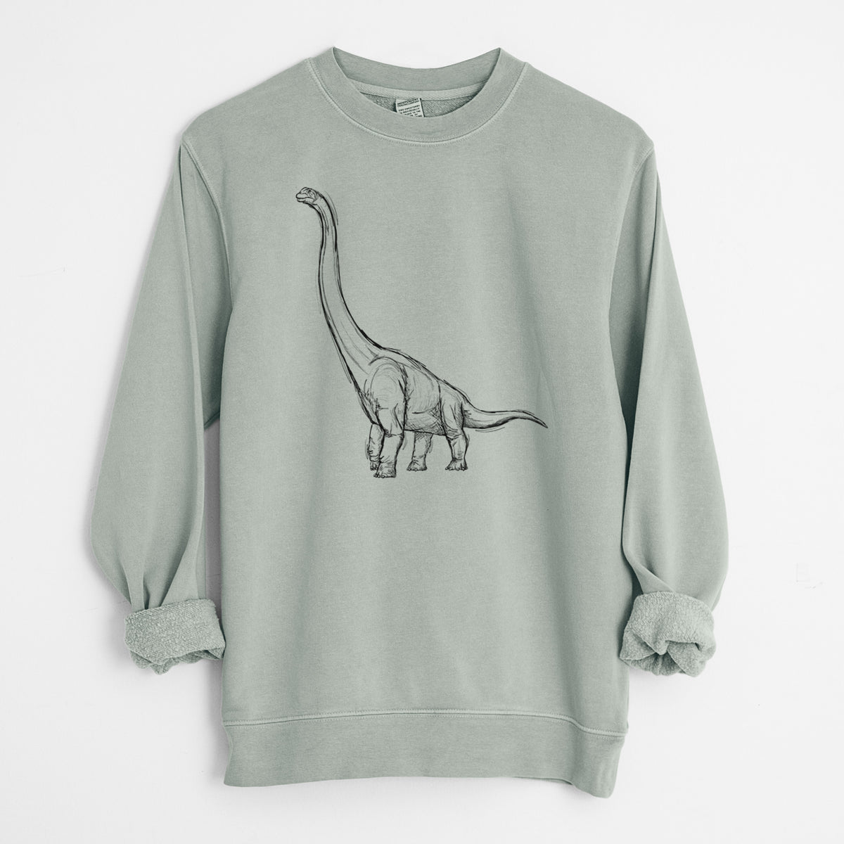 Sage green pigment dyed crewneck sweatshirt laid flat with the sleeves rolled, printed with a black ink illustration of a long-necked Apatosaurus walking.